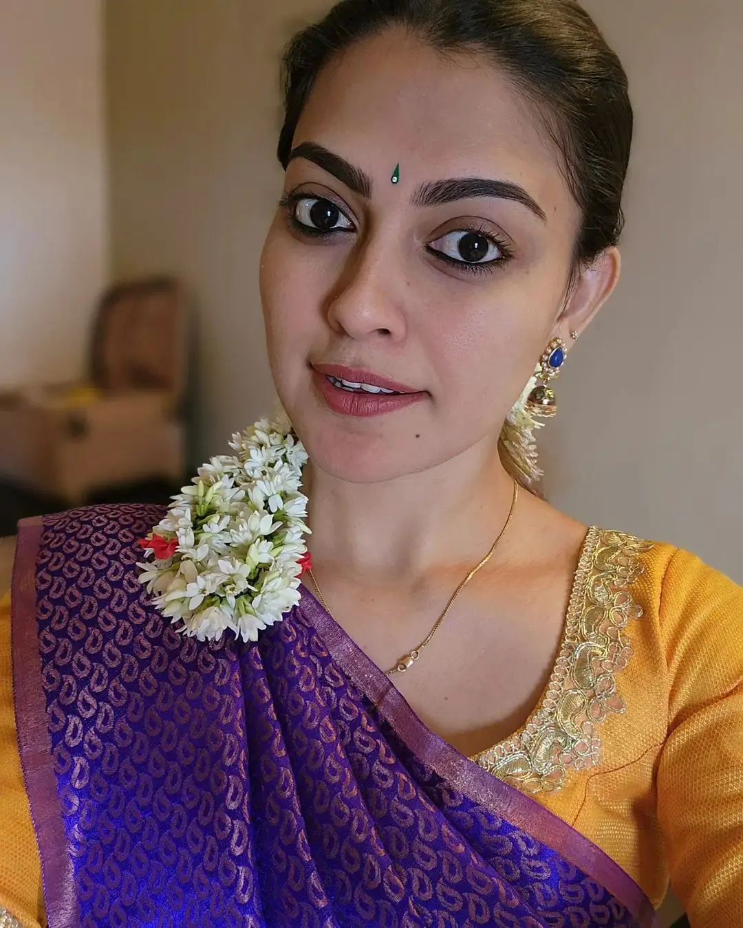 Anusree Nair Wearing Beautiful Earrings Jewellery Blue Saree Yellow Blouse